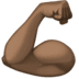 💪🏿 flexed biceps: dark skin tone display on Facebook